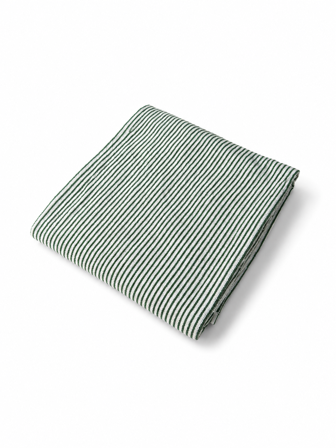 Folded Native green and white striped beach towel viewed at an angle on a white background.