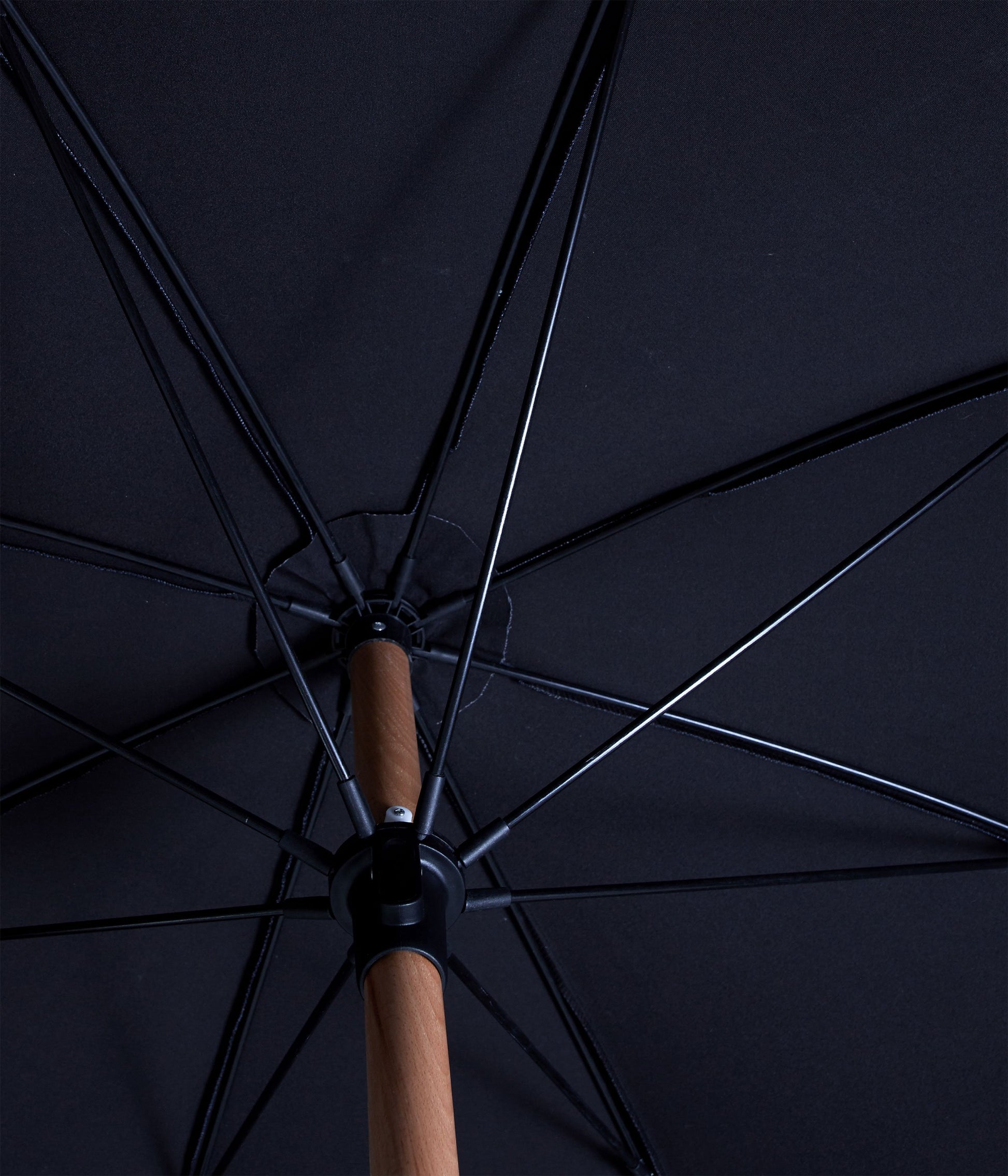 Sunday Supply Co Black Rock beach umbrella open and seen from underneath.